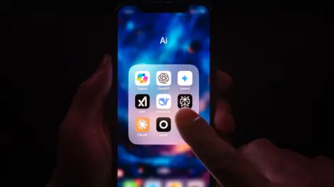 Getty Images AI apps on a phone screen, including Copilot, ChatGPT, Gemini, Grok, DeepSeek, Claude and Lensa.
