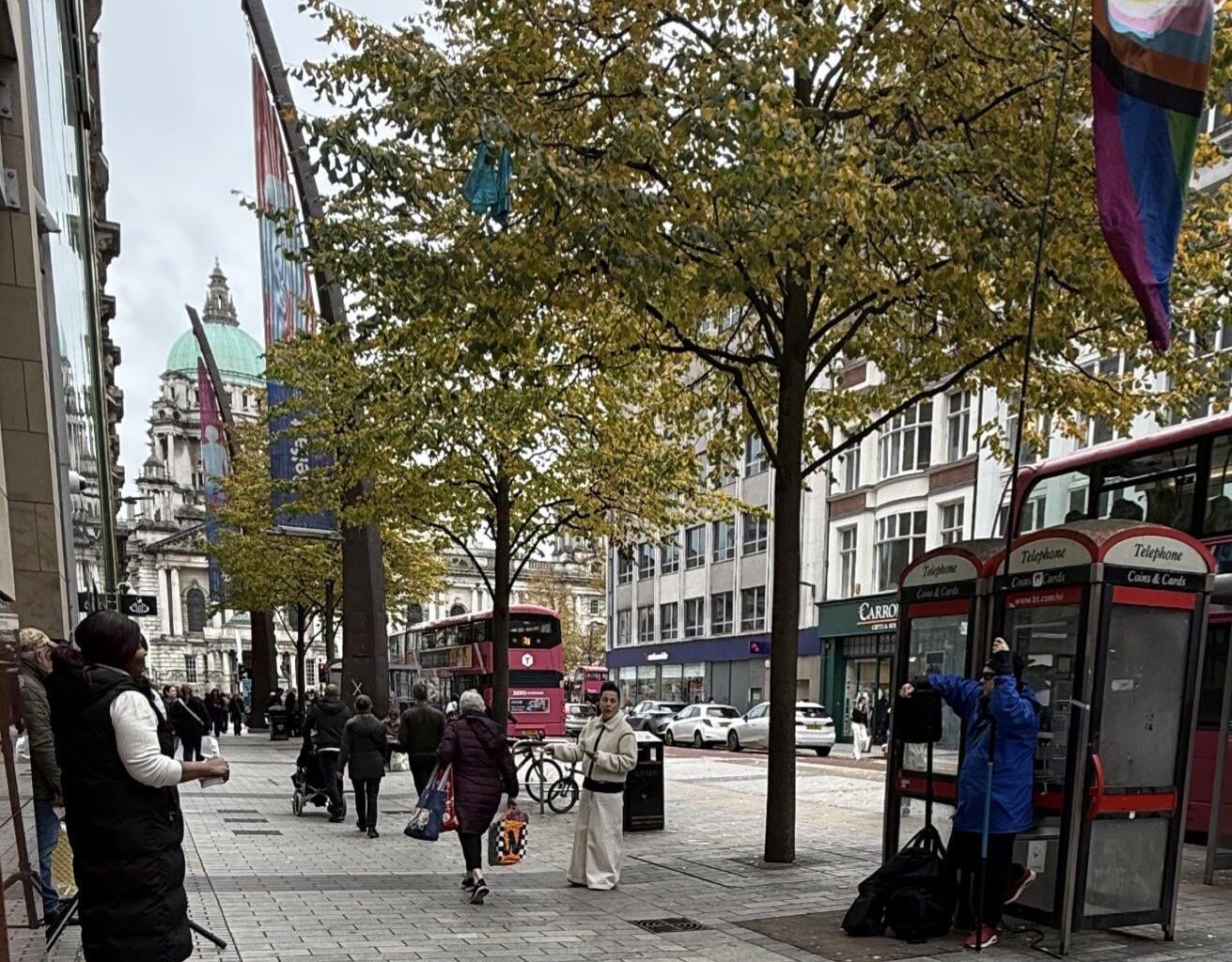 Stand-off in the City Centre..person with huge LGBTQ+ flag facing off the screeching God-Squad. All afternoon..