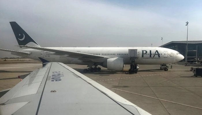 A PIA passenger plane sits on tarmac, as seen through a plane window, at the Islamabad International Airport, Islamabad, on October 27, 2024. —Reuters
