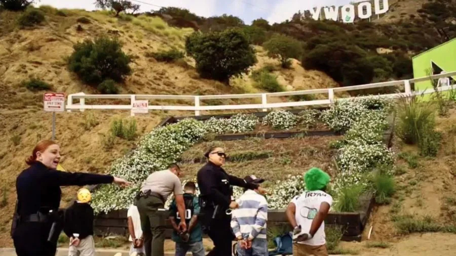 Six suspects are seen being detained after vandalizing the Hollywood sign. September 2025. (LAPD)