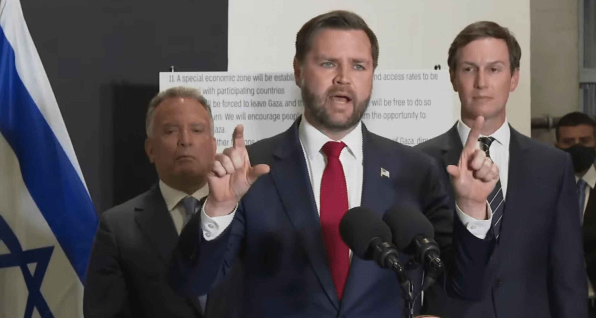 J.D. Vance speaks to press.