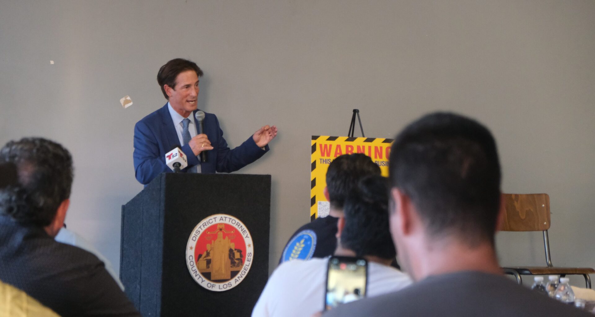 Protesters and residents confront D.A. Hochman at East L.A. town hall on crime and immigration