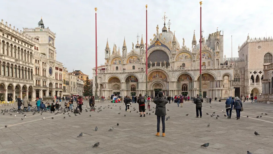 Venice, Italy - January 9, 2017: Few Tourists at San Marco Square Cold Winter Day in Venice, Italy.