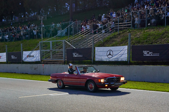 Formula One racing driver Valtteri Bottas is being driven around in a classic Mercedes on Sunday at the Peaches Run Universe 2025 show run event in Yongin, Gyeonggi. [PEACHES]
