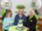 Asda Ballyclare colleagues join celebrations as retailer marks 20th year anniversary in NI. Steven Henry, GSM, Trevor Wilson, Community Champion, Helen Gault, Long Service Colleague