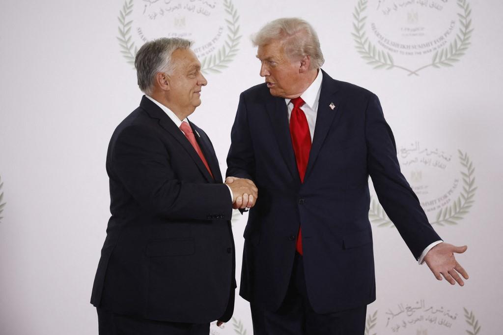 Hungary's Prime Minister Viktor Orban (L) and US President Donald Trump (R) shake hands during the greetings ceremony at the Gaza Peace Summit in Sharm El-Sheikh on October 13. Photo: AFP