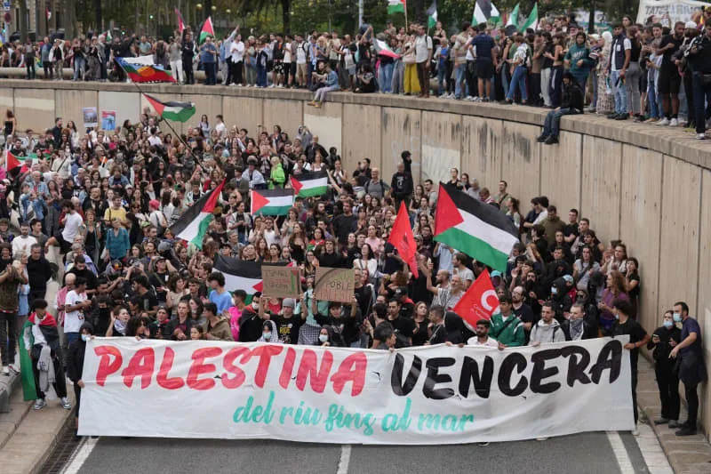 People take part in a protest in solidarity with Palestine and support the Sumud Global Flotilla, which has been intercepted by the Israeli army. David Zorrakino/EUROPA PRESS/dpa
