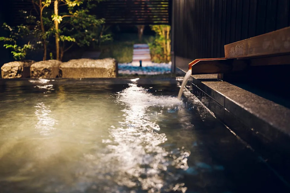 The hotel is near the public hot spring that attracts visitors to the spa town (KAI Nagato)