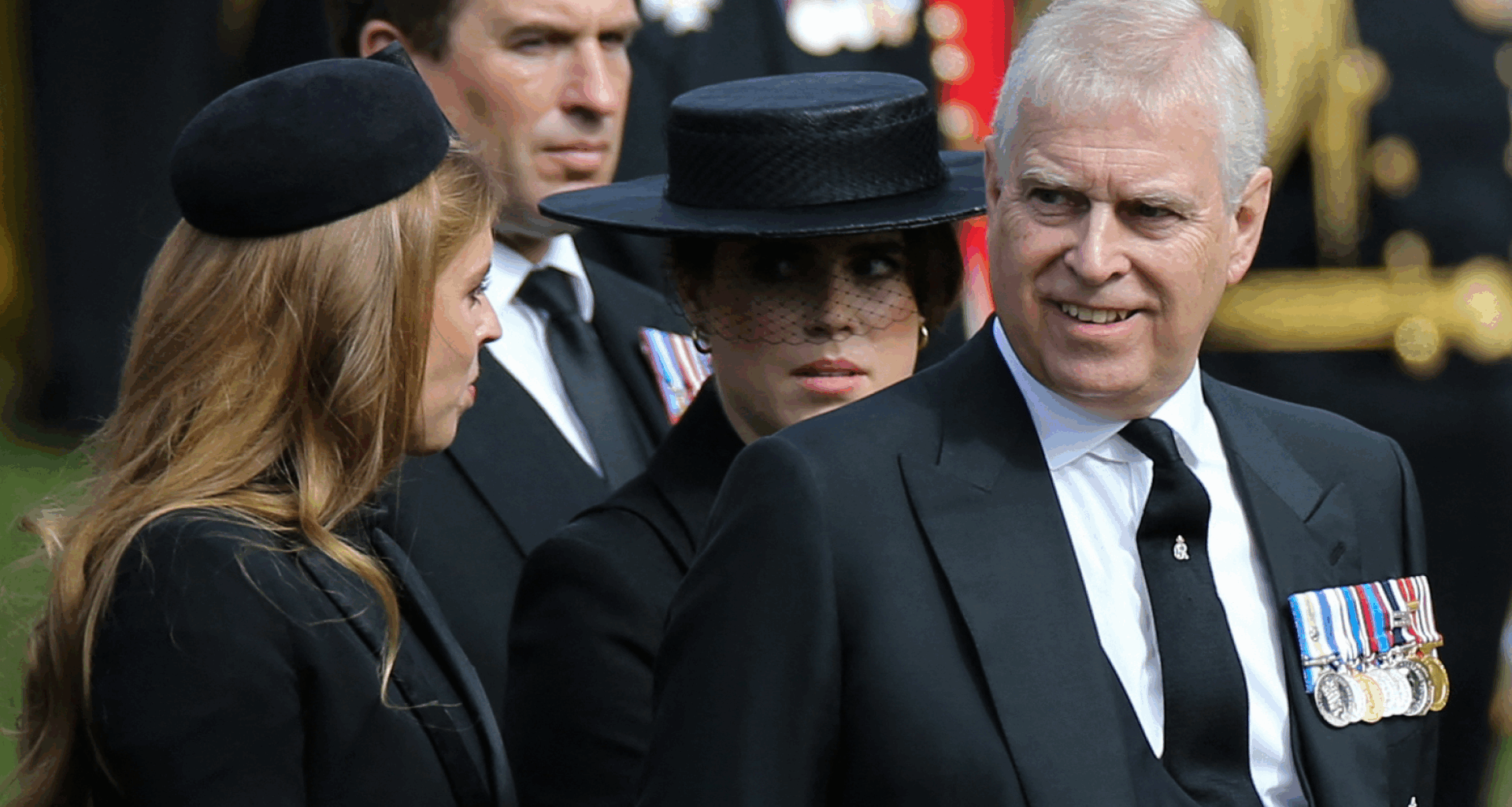 Prince Andrew smiling at Princess Beatrice, with Princess Eugenie in a black veiled hat behind them