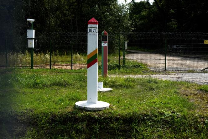 Markers indicating the border between Lithuania and Belarus at Medininkai, Lithuania, August 24, 2021.