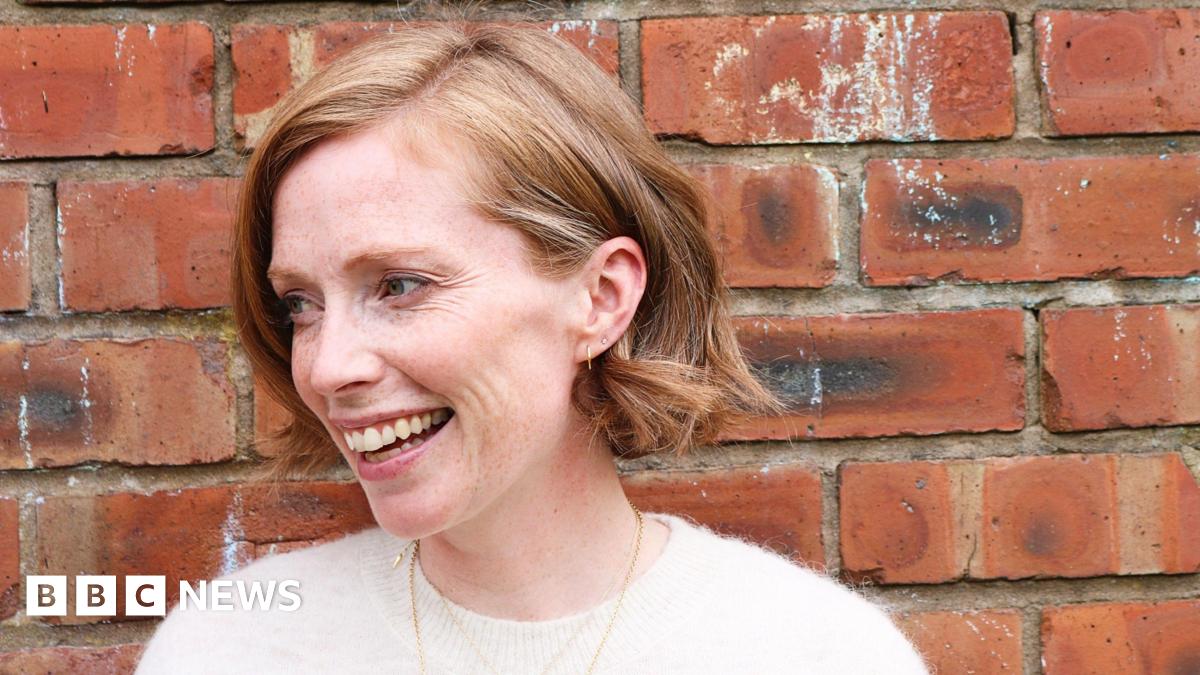 Woman with short hair smiling
