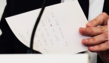 A whisper and a note: Photos document moment Trump was informed Gaza deal sealed - The Times of Israel