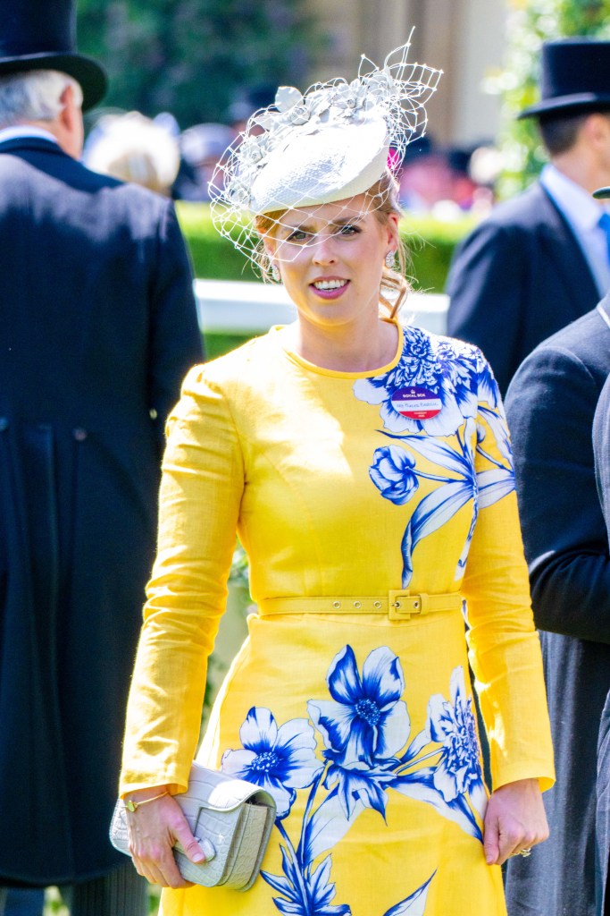 Princess Beatrice wearing a yellow floral dress and fascinator