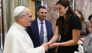 Villanova basketball alum Maddy Siegrist shakes fellow Villanova alum Pope Leo XIV's hand at the Vatican.