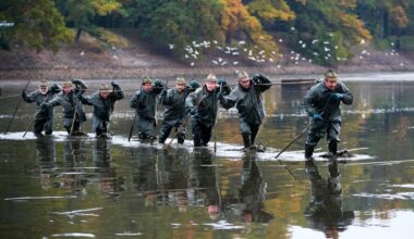 Photos show Czech fisherman hauling in Christmas carp for holiday tables