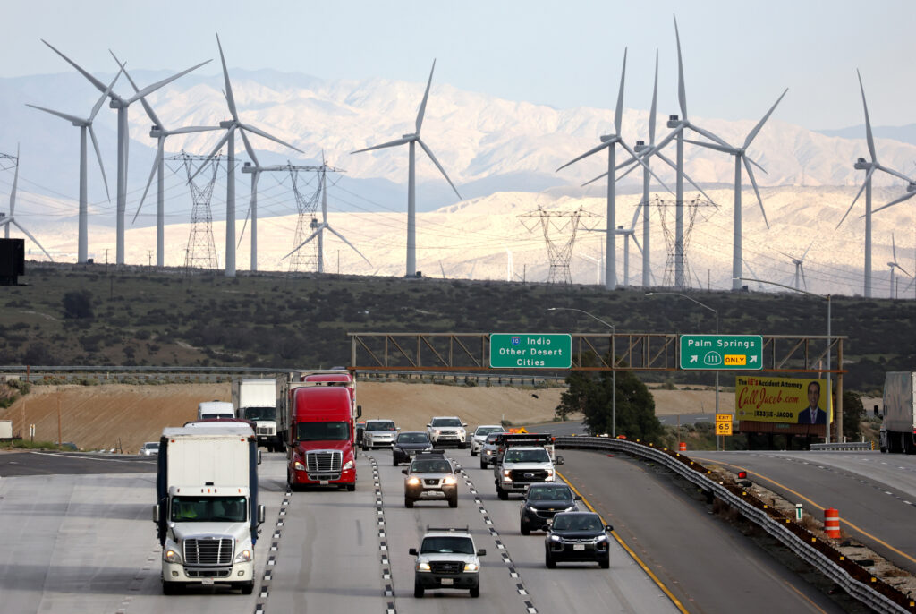 Wind turbines operate adjacent to a highway near Whitewater, Calif. Credit: Mario Tama/Getty Images