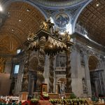 A picture shows the newly renovated baldachin, a large Baroque sculpted bronze canopy over the high altar of St. Peter's Basilica, 2024.