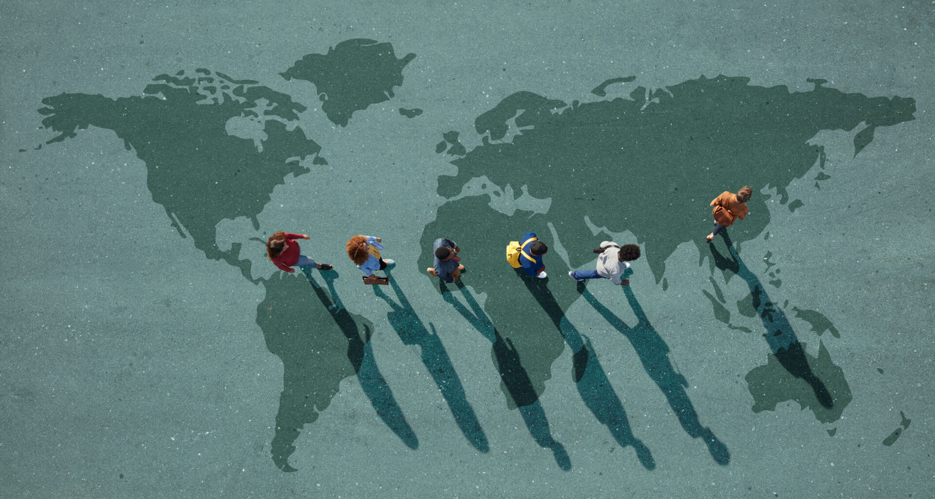 Group of young adults, photographed from above, on various painted tarmac surface, at sunrise.