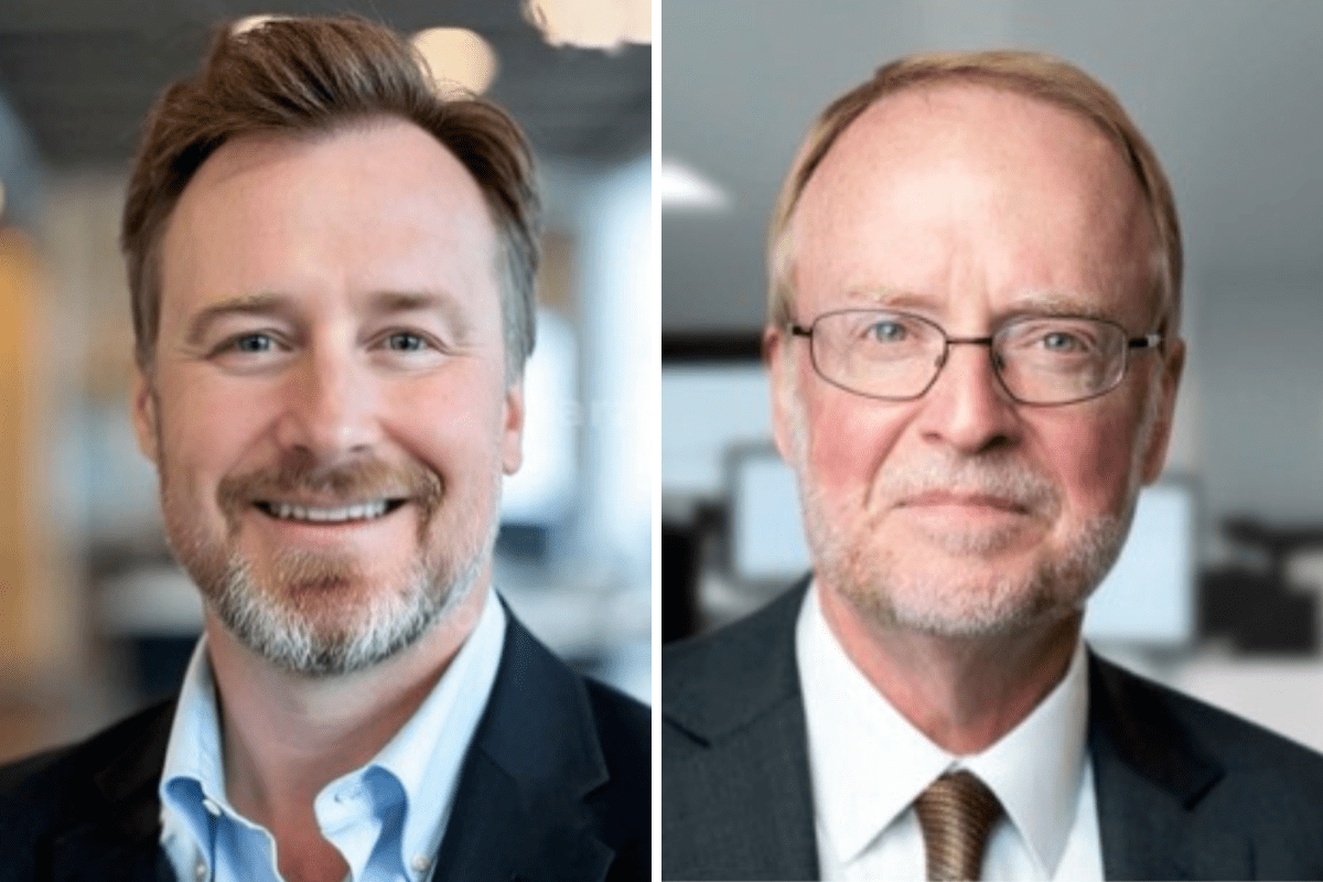 Two men in business attire are shown in side-by-side portraits. The man on the left is smiling with a short beard, while the man on the right wears glasses and has a neutral expression.