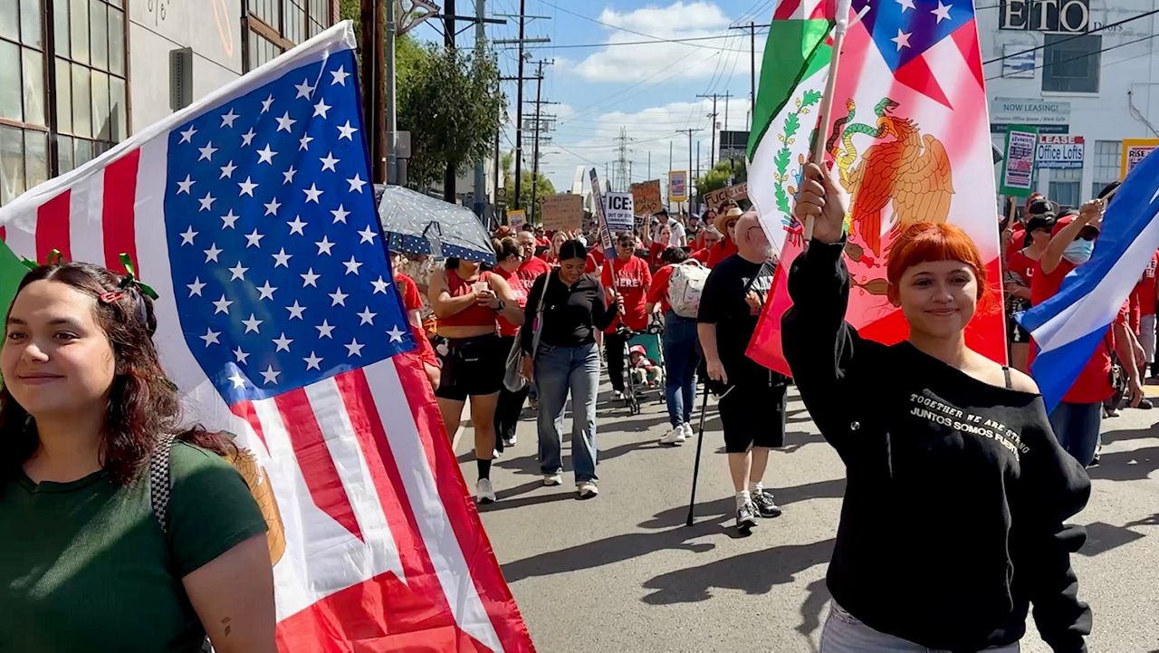 Thousands march in downtown LA to protest ICE raids