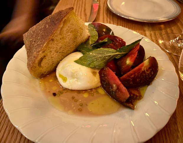 The Best of Season Tomatoes, Burrata and Cast-Iron Focaccia WV Salt from Chef Tyler Wells' restaurant Betsy in Altadena. (Photo by Erik Pedersen/SCNG)
