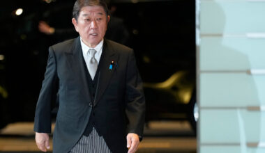 Toshimitsu Motegi, newly appointed foreign minister, arrives at the prime minister's office in Toky...