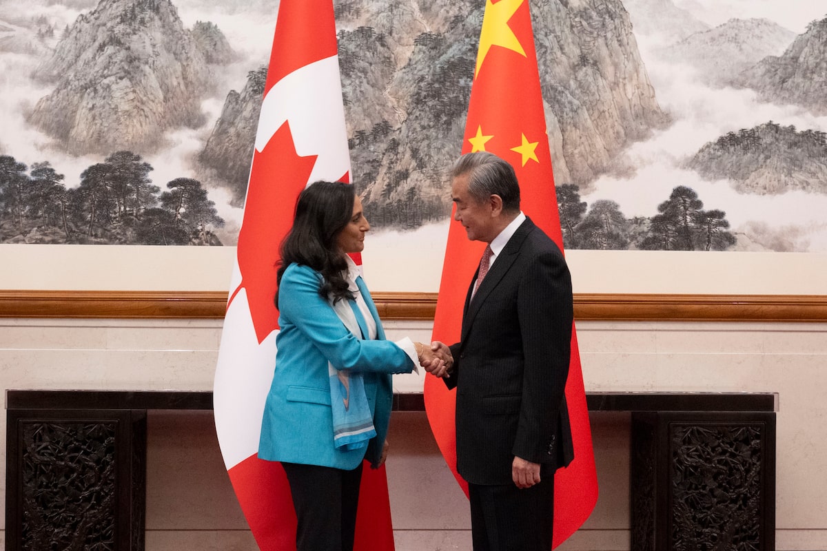 In Beijing, Anand signals warming relationship with China