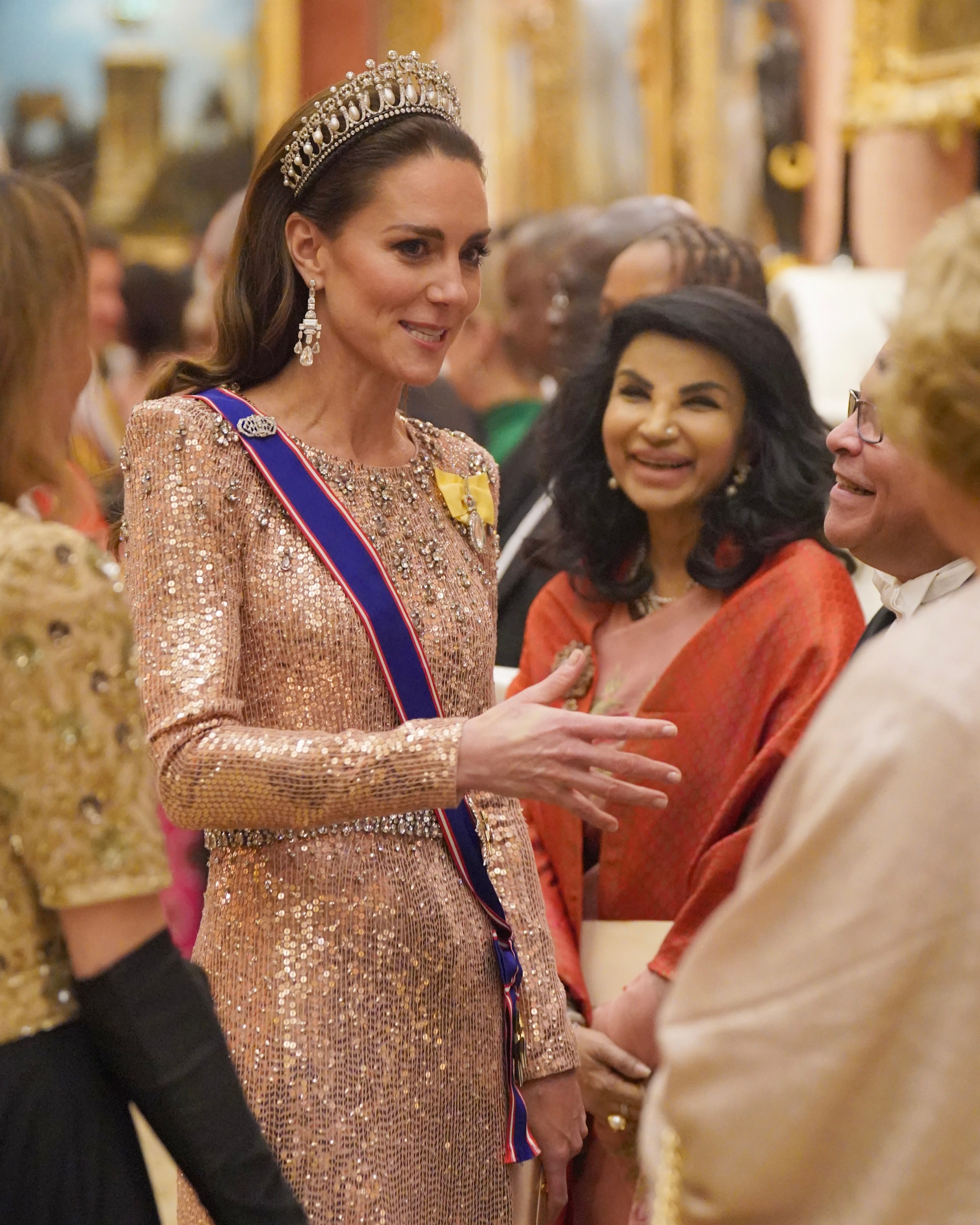 The Royal History of The Cambridge Lover's Knot Tiara 11 Kate Middleton wears the Lover's Knot Tiara during an evening reception for the Diplomatic Corps at Buckingham Palace