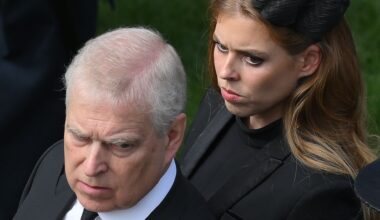 Prince Andrew looks stern wearing a suit and Princess Beatrice wears a black dress