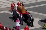 The coffin of Pope Francis is carried into St Peter's Square for his funeral, at the Vatican, Saturday, April 26, 2025. (AP Photo/Gregorio Borgia)