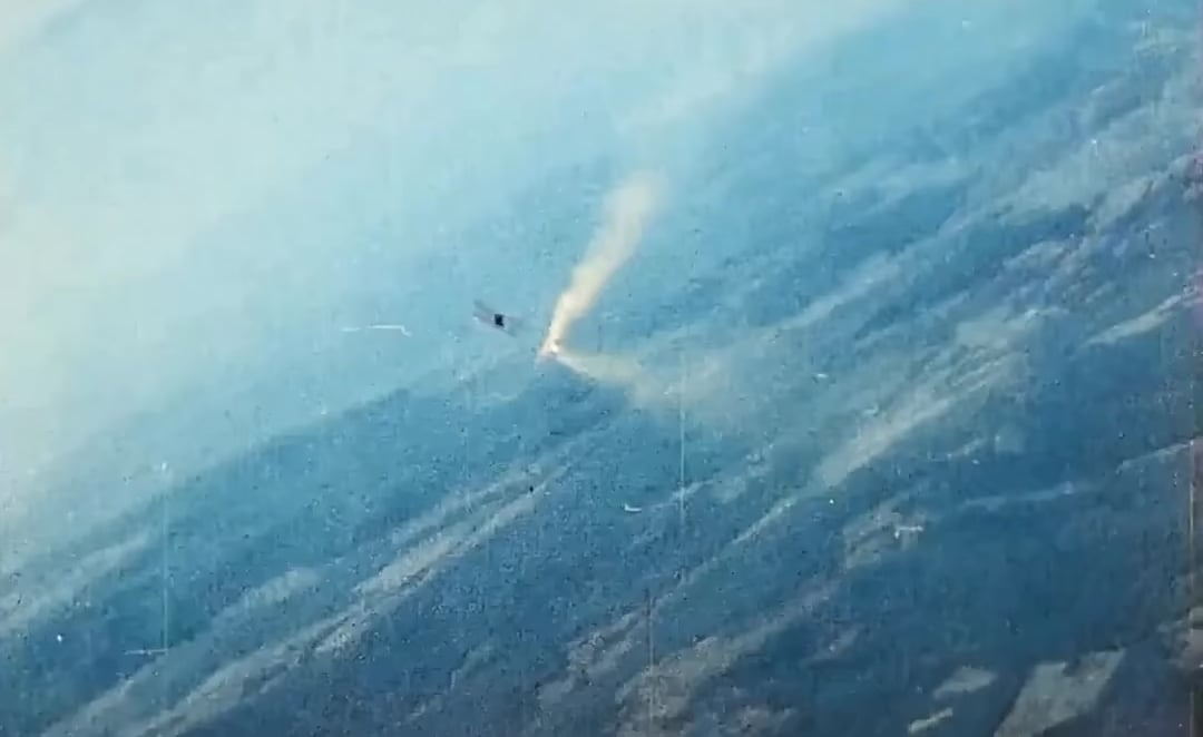 Soviet i-153 dodging fire from a German BF109