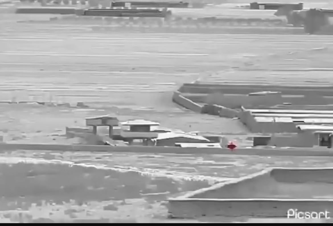 Afghan Taliban retreat from a border post after it is struck by Pakistani Artillery