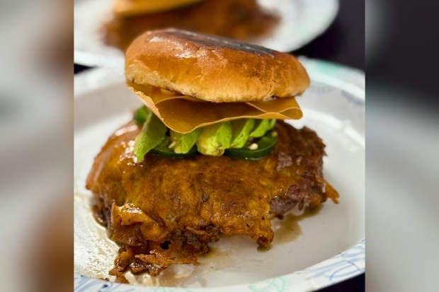 Banger Lumpia's prize-winning burger. (Photo by Brock Keeling, Orange County Register/SCNG)