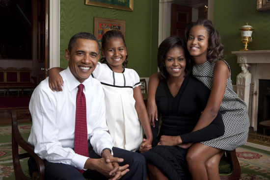 President Barack Obama, First Lady Michelle Obama, and their daughters, Malia and Sasha, sit for a  family portrait in the Green Room of the White House, Sept. 1, 2009. (Official White House Photo)..Photo by Annie Leibovitz/Released by White House Photo Office..This official White House photograph is being made available only for publication by news organizations and/or for personal use printing by the subject(s) of the photograph. The photograph may not be manipulated in any way and may not be used in commercial or political materials, advertisements, emails, products, promotions that in any way suggests approval or endorsement of the President, the First Family, or the White House. .