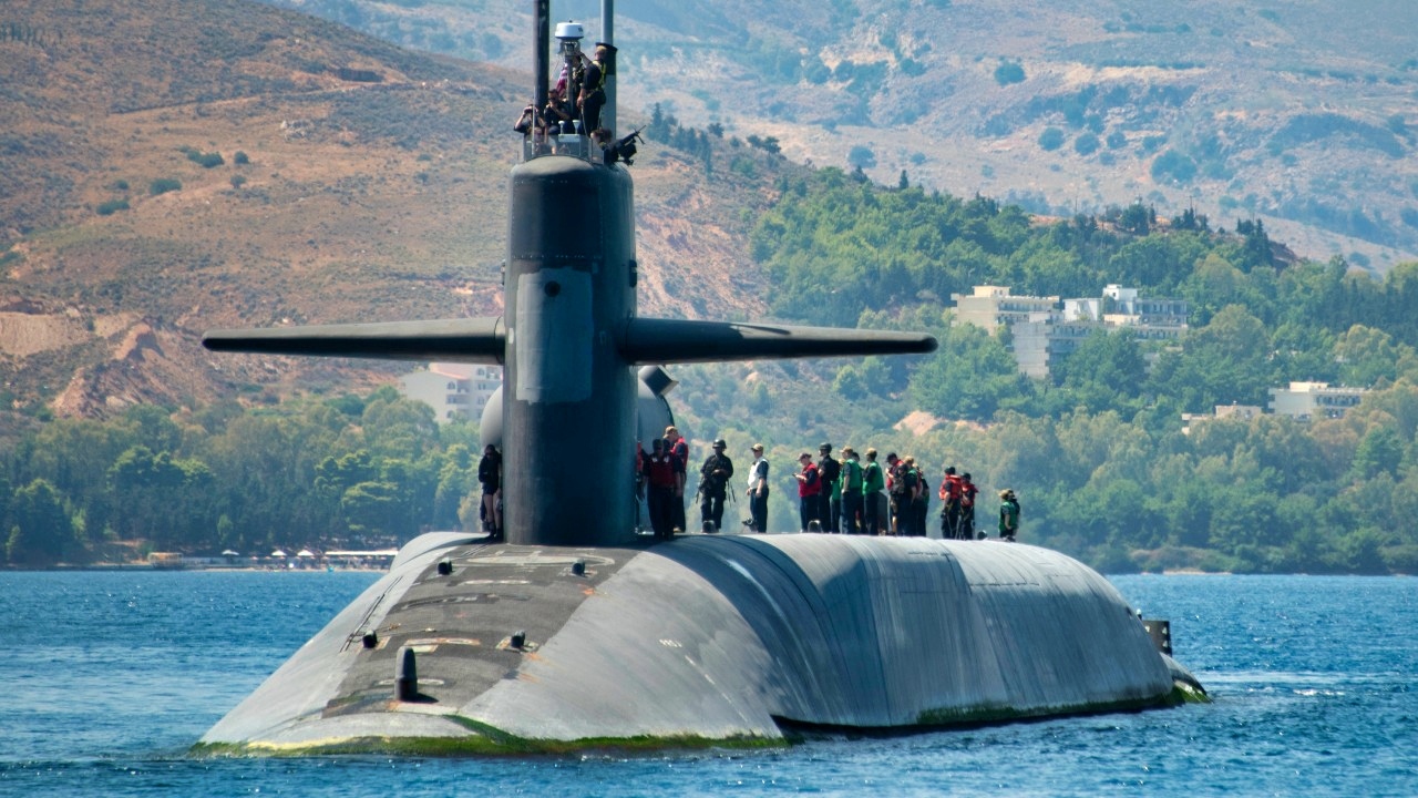 SOUDA BAY, Greece (Sept. 7, 2019) The Ohio-class cruise missile submarine USS Florida (SSGN 728) arrives in Souda Bay, Greece, for a scheduled port visit, Sept. 7, 2019. NSA Souda Bay is an operational ashore base that enables U.S., allied, and partner nation forces to be where they are needed and when they are needed to ensure security and stability in Europe, Africa, and Southwest Asia. (Photo by Joel Diller/Released)