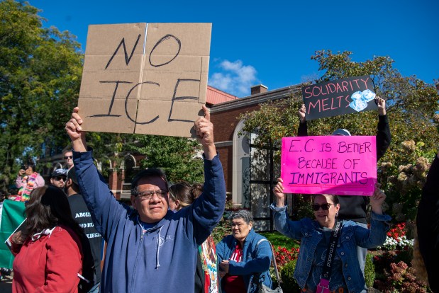 Benjamin Cruz holds a sign during anti-ICE protests along Indianapolis Boulevard outside East Chicago City Hall in East Chicago, Indiana, Saturday, Oct. 11, 2025. (Andy Lavalley/for the Post-Tribune)