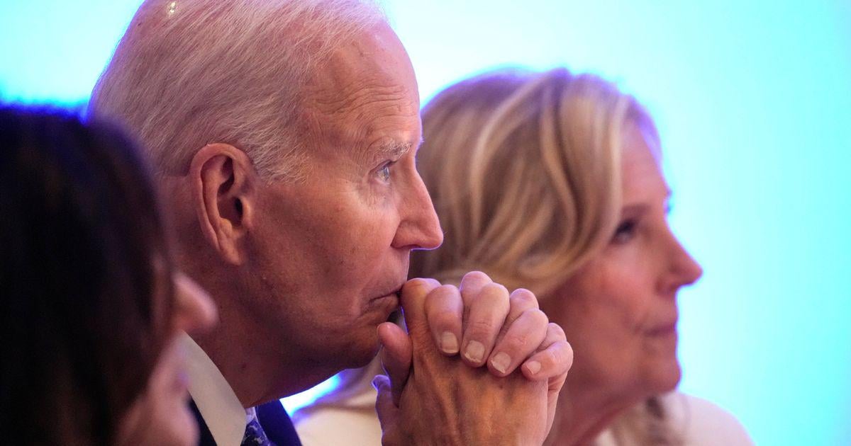 Biden warns of 'dark days' for America as he urges Americans to 'resist' Trump