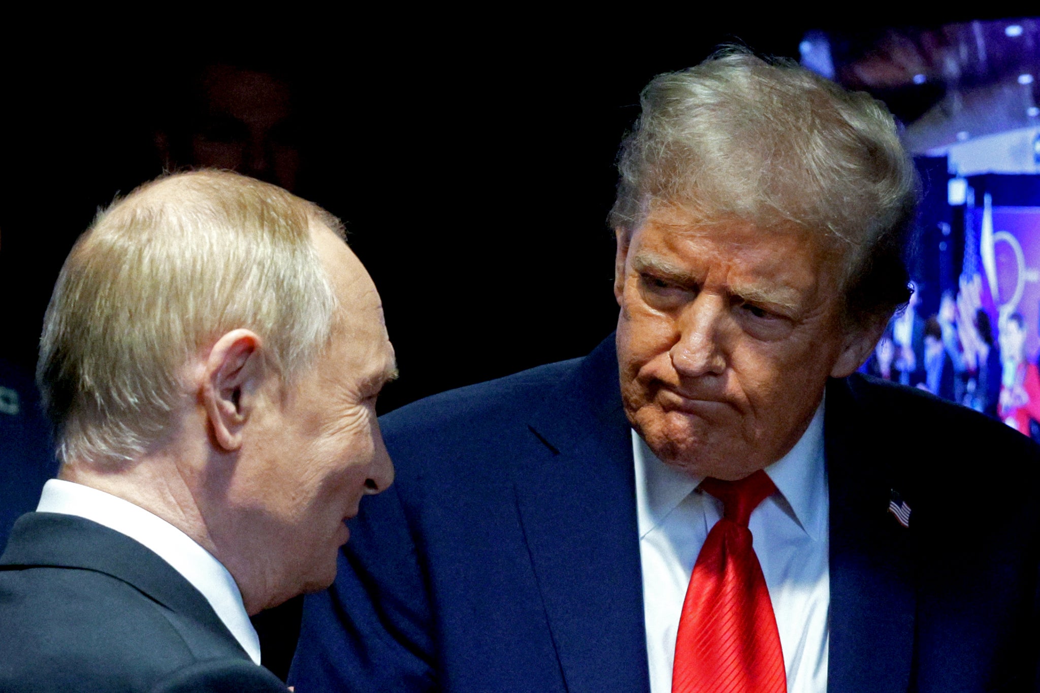 Donald Trump and Russian President Vladimir Putin shake hands after delivering a joint press conference following in Anchorage, Alaska, on August 15, 2025