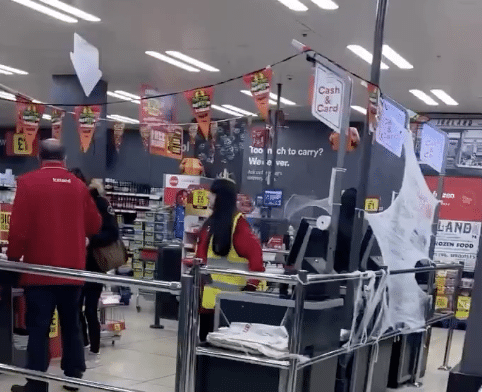 Shocking Moment Iceland Worker WHIPS Shopper, Shouting “Empty Your Bag” in Checkout Chaos