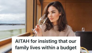Woman drinking wine on a train while looking out the window