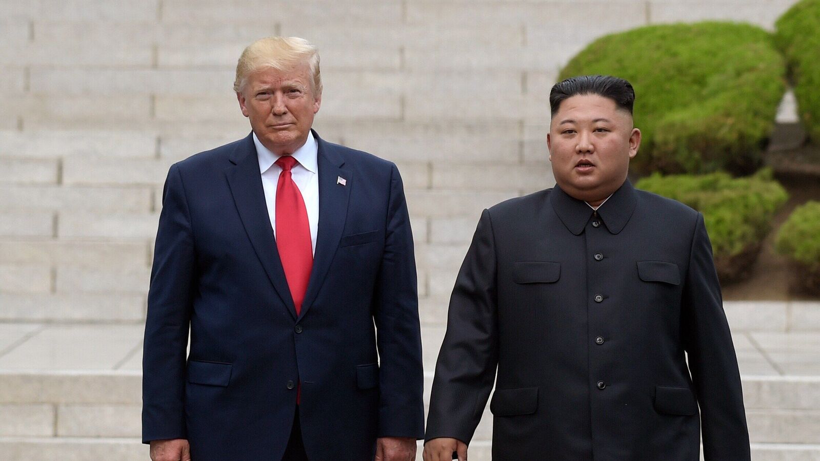Then U.S. President Donald Trump, left, meets with North Korean leader Kim Jong Un at the North Korean side of the border at the village of Panmunjom in Demilitarized Zone, on June 30, 2019. (AP Photo/Susan Walsh, File)