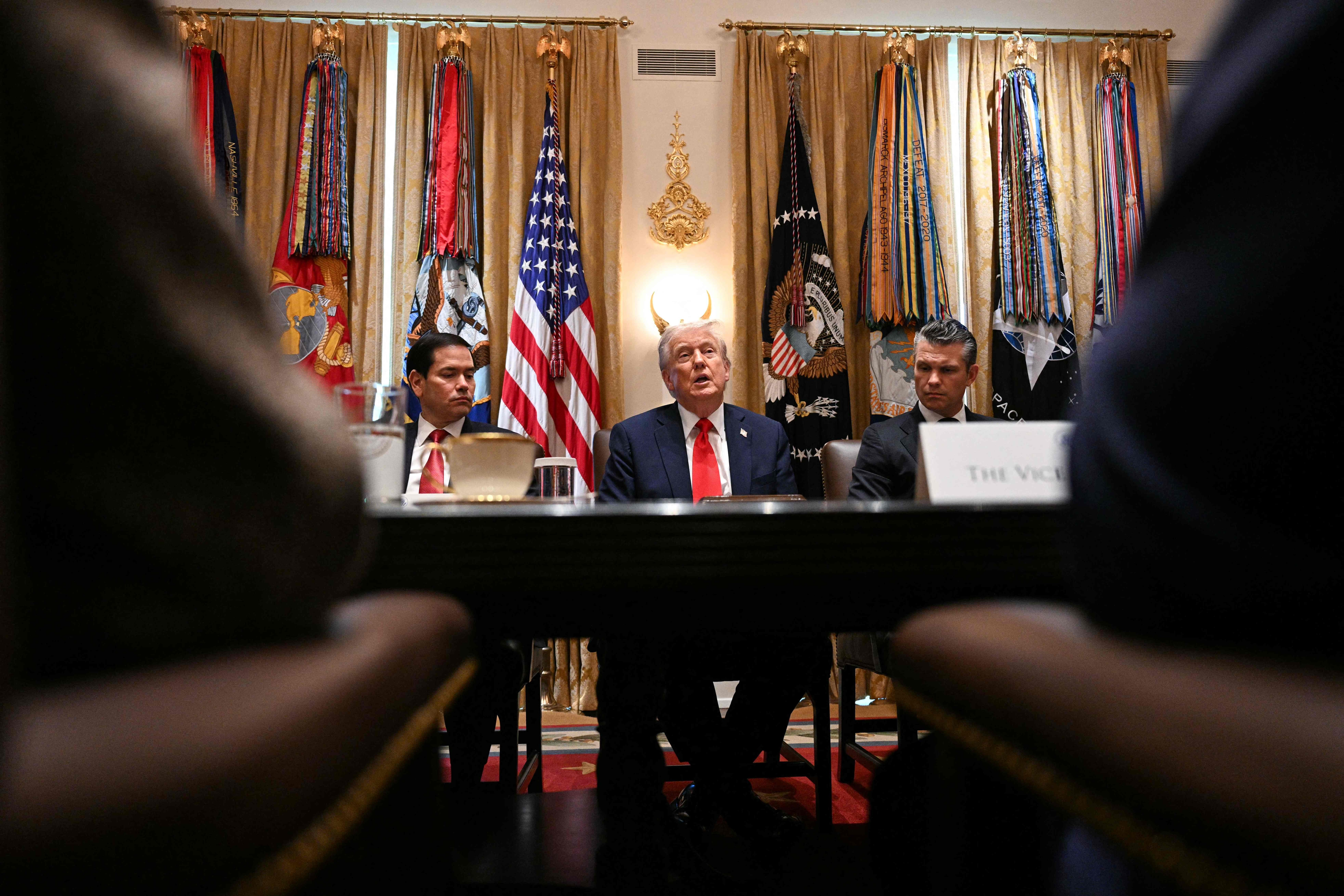 US President Donald Trump (C) speaks, alongside Secretary of State Marco Rubio (L) and Secretary of Defense Pete Hegseth (R), during a cabinet meeting in the Cabinet Room of the White House in Washington, DC, on October 9, 2025. (Photo by Jim WATSON / AFP)(AFP)