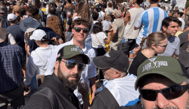 Bryan Stern and members of Grey Bull Rescue stand in the crowd at Hostages Square in Tel Aviv as families and supporters gather during the release of hostages from Gaza.