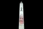 The Obelisk is illuminated with the image of the late Pope Francis at Plaza de la Republica square in Buenos Aires on April 25, 2025, on the eve of his burial to be held at the Vatican. Pope Francis died on April 21, 2025, aged 88.