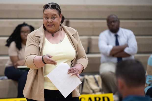 Gary Advocates for Responsible Development co-founder Kimmie Gordon speaks to IDEM employees during a public meeting to discuss the renewal of Carmeuse Lime's operating permit in Gary on Thursday, June 1, 2023. (Kyle Telechan for the Post-Tribune)