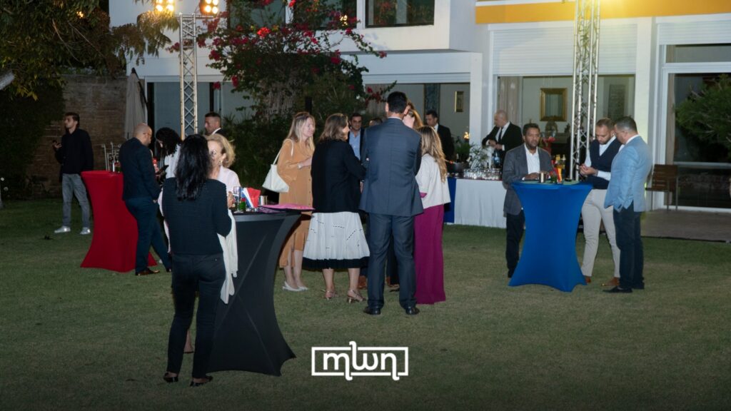 The centennial celebration, held in the gardens of the Belgian Ambassador’s residence in Souissi, brought together diplomats, business leaders, and officials
