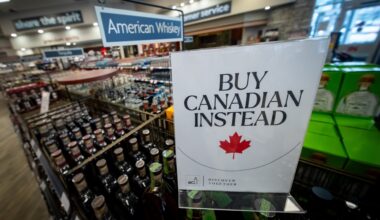 A sign in front of the American whiskey section at a Vancouver liquor store after American-made products were removed from shelves in February 2025.