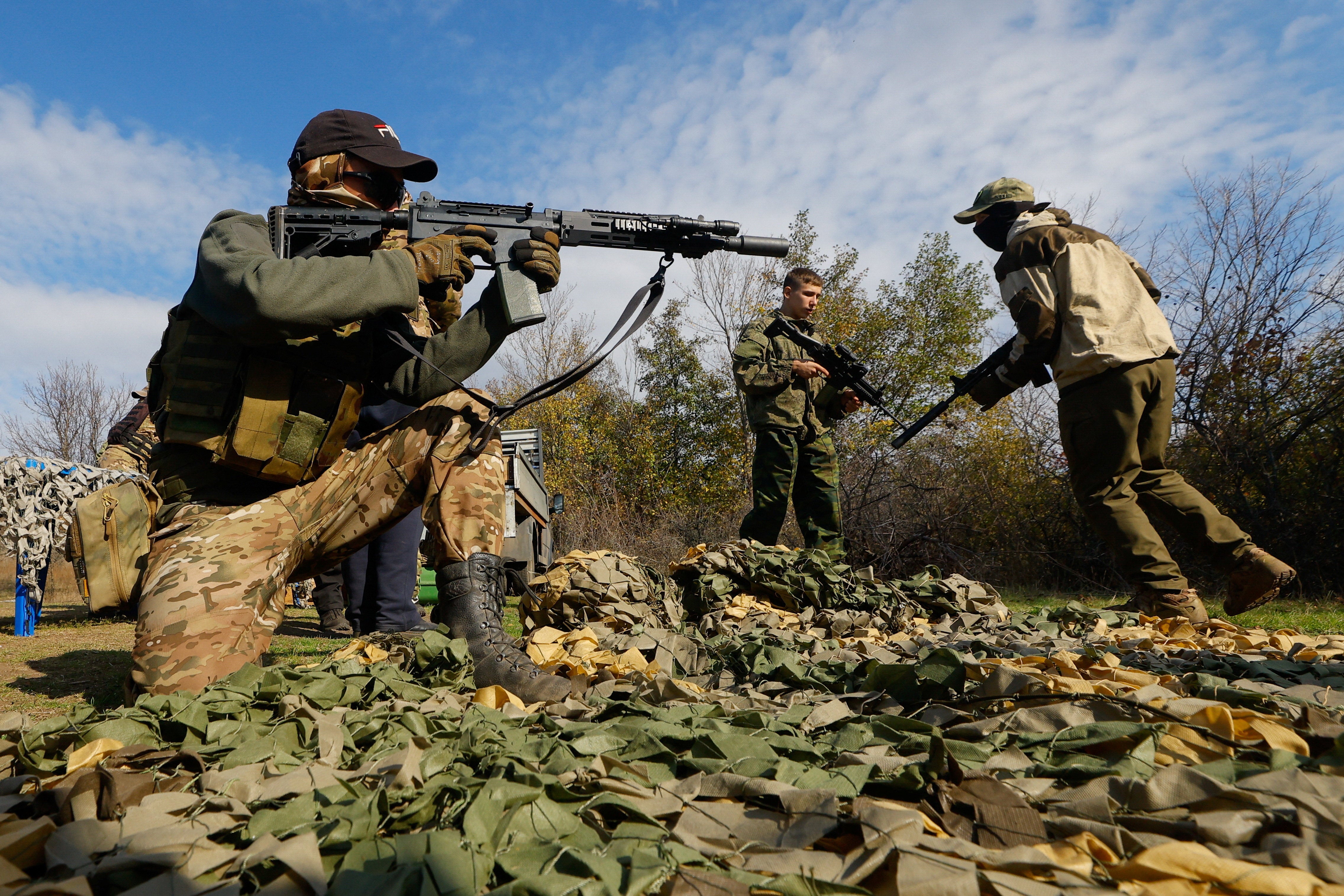 Youngsters undergo a training course at a Russian military-patriotic camp amid Russia-Ukraine conflict in the Donetsk region, a Russian-controlled area of Ukraine, October 18, 2025