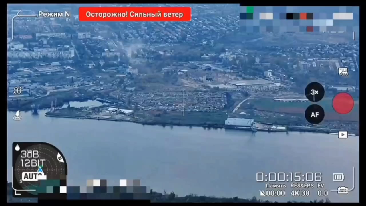This morning, Russian forces attacked Kherson using MLRS. The scatter of the projectiles was so wide that some of the rockets fell into the water/onto empty fields. Russia POV drone. 24.10.2025