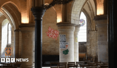 Graffiti written on walls and posts within Canterbury cathedral